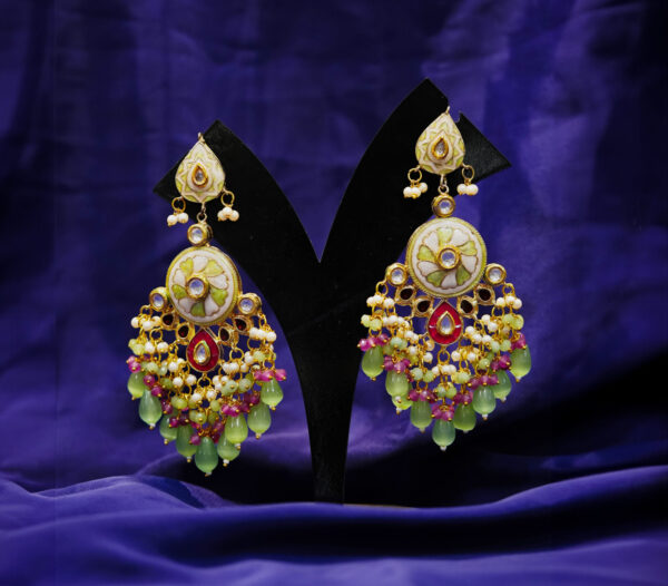 Elegant handcrafted gold-plated chandelier earrings with intricate meenakari work, adorned with sparkling stones, pearls, and colorful bead drops in green, pink, and white. A perfect blend of traditional and contemporary design for festive and bridal wear.